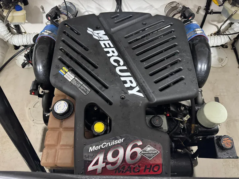 Slide: The Image of MerCruiser 496 MAG HO engine in a 2003 Profile 290 boat. - 18