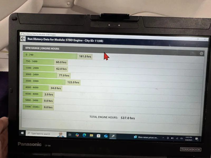 Slide: The Image of Laptop displaying engine run history data with RPM range and total engine hours. - 19