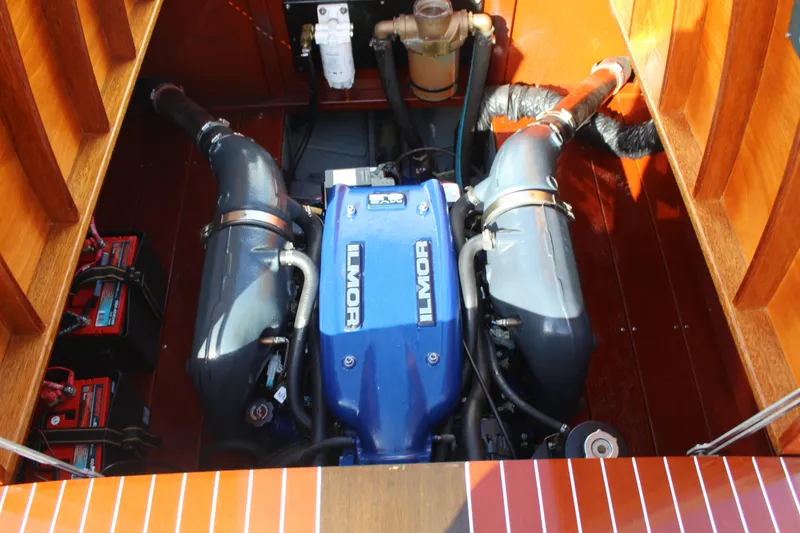 Slide: The Image of Engine compartment of a 2017 Hacker-Craft 30 boat featuring an Ilmor engine. - 3