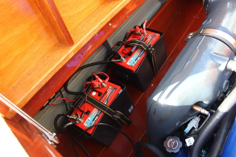 Slide: The Image of Engine compartment of 2017 Hacker-Craft 30 with batteries and wiring. - 5