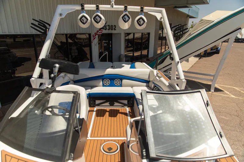 Slide: The Image of 2015 Axis 22 boat interior with modern seating and audio system. - 10
