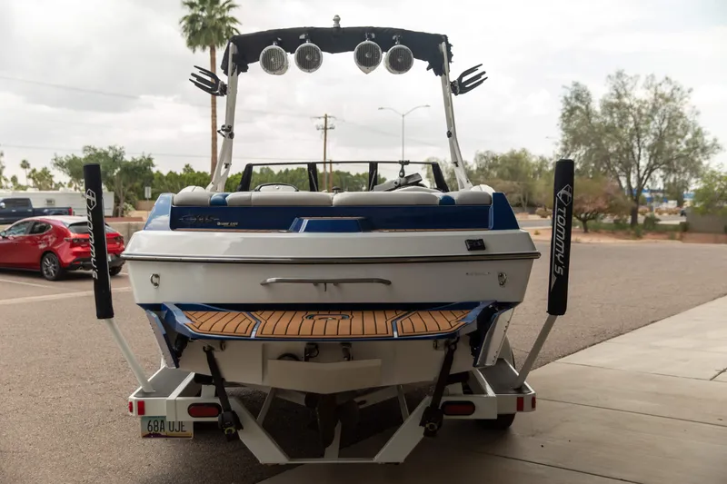 Slide: The Image of 2015 Axis 22 boat rear view with speakers and swim platform. - 3