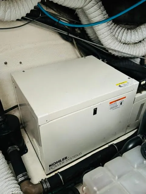 Slide: The Image of Kohler power system in 2006 Rinker 390 Express Cruiser engine room. - 20