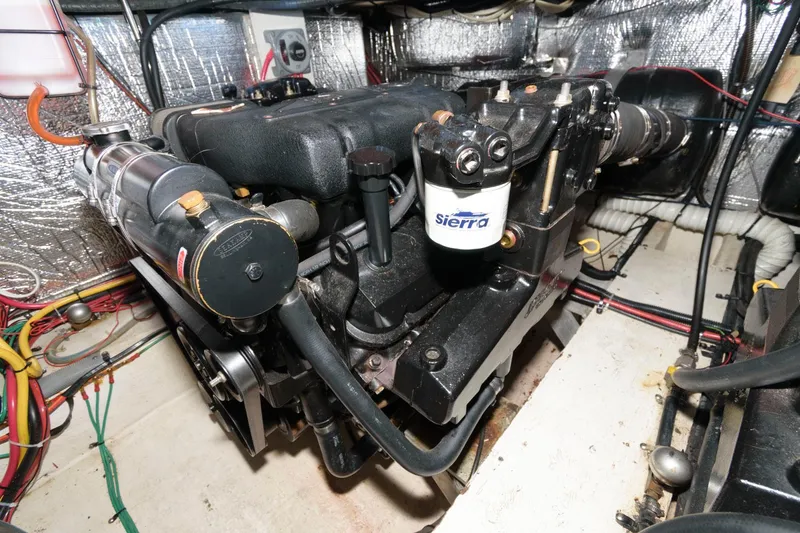 Slide: The Image of Engine room of 1999 Cruisers Yachts 3750 Motoryacht with visible Sierra filter. - 29