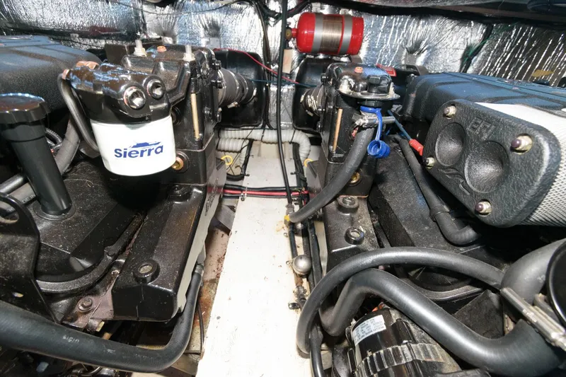 Slide: The Image of Engine room of 1999 Cruisers Yachts 3750 Motoryacht with visible components and wiring. - 30