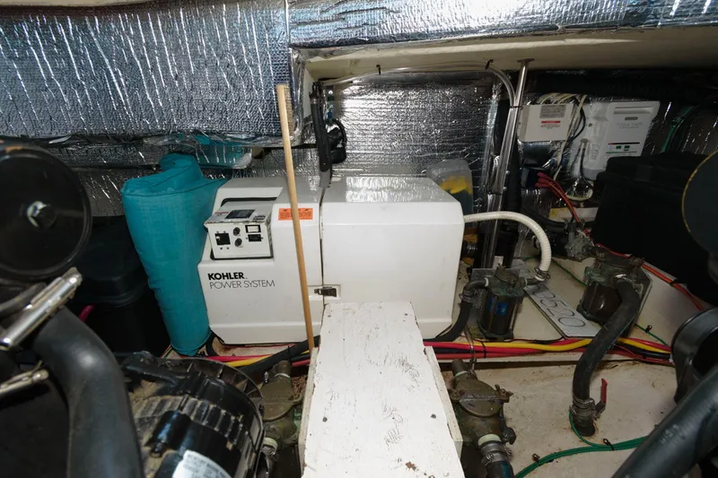 Slide: The Image of Engine room of 1999 Cruisers Yachts 3750 Motoryacht with Kohler power system. - 31