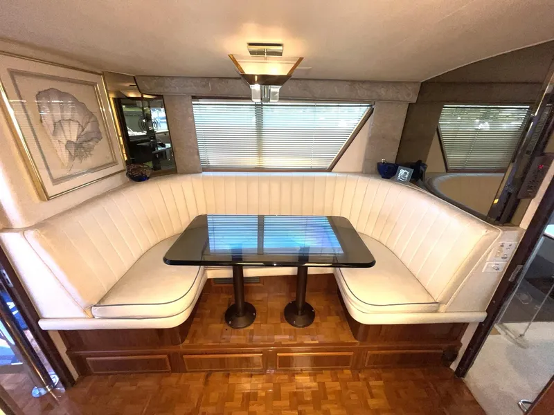 Slide: The Image of CRESENT SHAPED DINETTE W/FIXED TABLE - 16