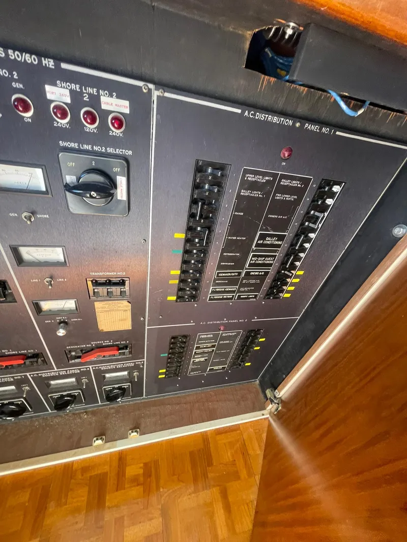 Slide: The Image of Electrical control panel on a 1989 Hatteras 80 Cockpit Motor Yacht. - 40