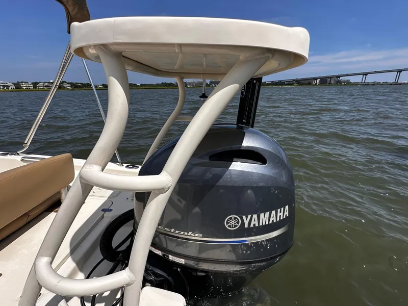 Slide: The Image of 2020 Scout 177 Sport boat with Yamaha outboard motor on a sunny day. - 17