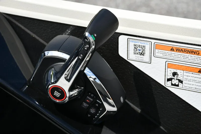Slide: The Image of Throttle control of 2024 Premier 250 Solaris boat with warning labels and QR code. - 15