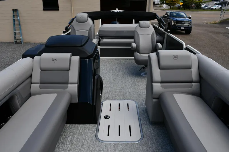 Slide: The Image of 2024 Premier 250 Solaris pontoon boat interior with luxurious seating and modern design. - 8