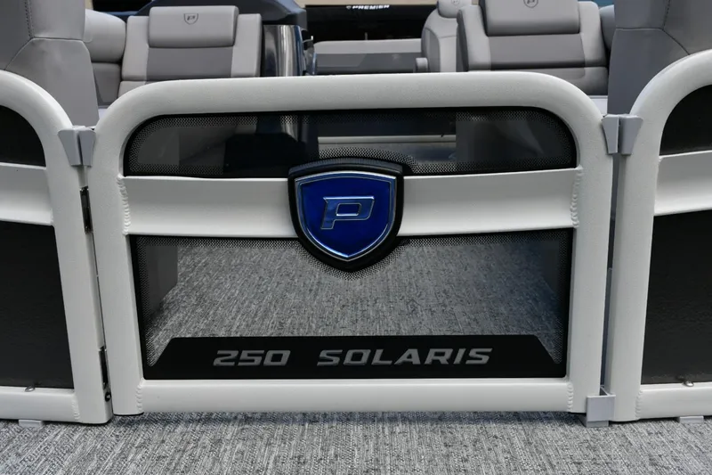 Slide: The Image of 2024 Premier 250 Solaris boat interior with logo and seating. - 9