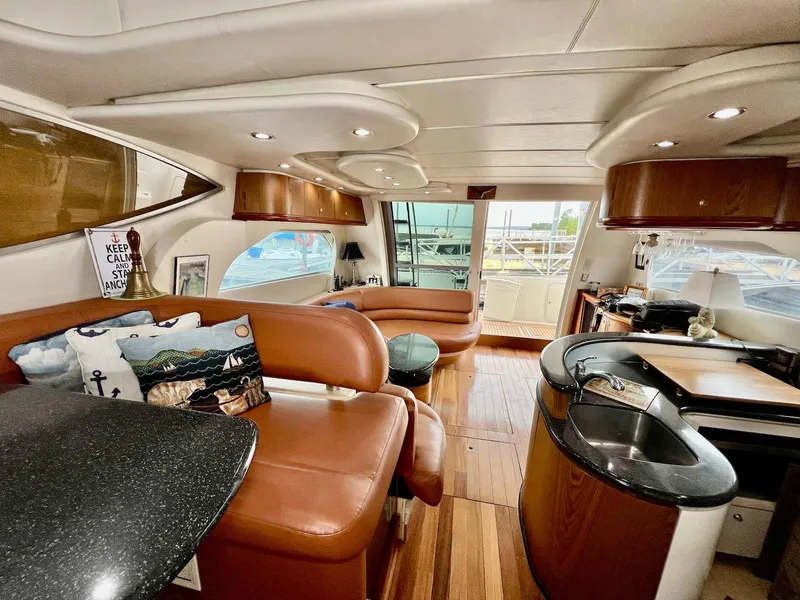 Slide: The Image of Luxurious interior of 2001 Maxum 4600 SCB yacht with leather seating and modern kitchen. - 15