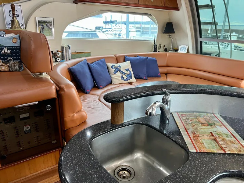 Slide: The Image of Luxurious interior of 2001 Maxum 4600 SCB yacht with leather seating and modern amenities. - 17