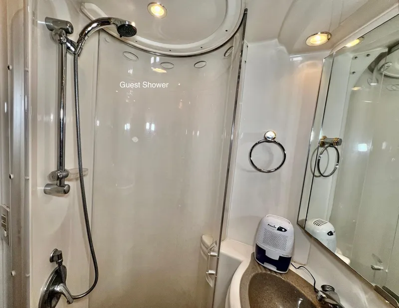 Slide: The Image of 2001 Maxum 4600 SCB guest shower with modern fixtures and lighting. - 30