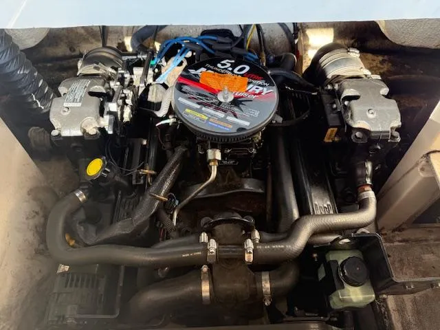 Slide: The Image of Engine of 2004 Chaparral 210 SSi boat, showcasing mechanical components and details. - 16