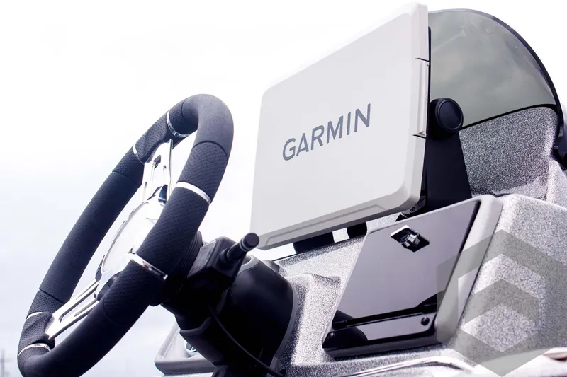 Slide: The Image of 2025 Caymas CX 21 PRO boat dashboard with Garmin navigation system. - 17