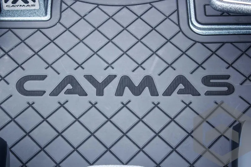 Slide: The Image of 2025 Caymas CX 21 PRO boat floor with diamond pattern and logo. - 29