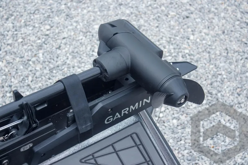 Slide: The Image of 2025 Caymas CX 21 PRO with Garmin trolling motor on gravel background. - 34