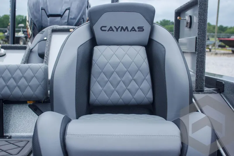 Slide: The Image of 2025 Caymas CX 21 PRO boat seat with diamond-stitched gray upholstery. - 36