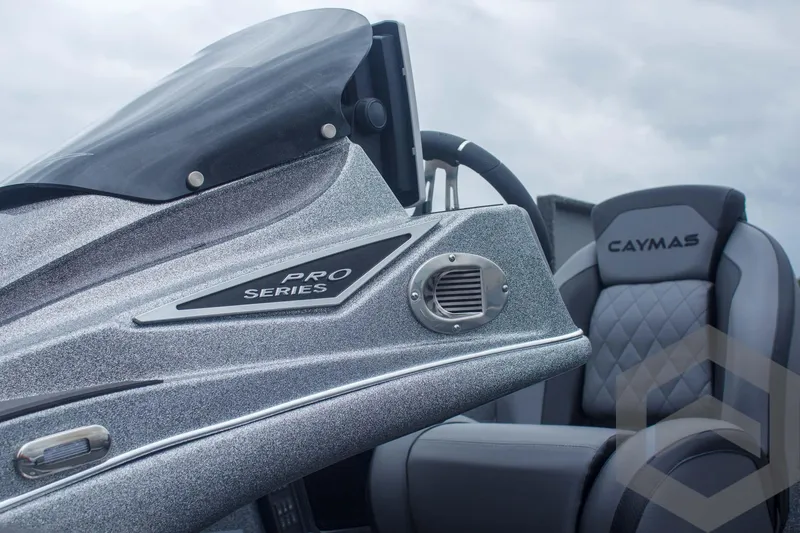 Slide: The Image of 2025 Caymas CX 21 PRO boat interior with sleek design and comfortable seating. - 38