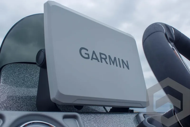 Slide: The Image of Garmin display on 2025 Caymas CX 21 PRO boat dashboard, featuring modern navigation technology. - 42