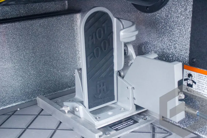 Slide: The Image of Hot Foot pedal in 2025 Caymas CX 21 PRO boat, featuring sleek metallic design. - 44