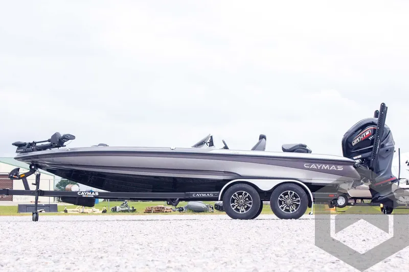 Slide: The Image of 2025 Caymas CX 21 PRO boat on trailer, side view, outdoors. - 8