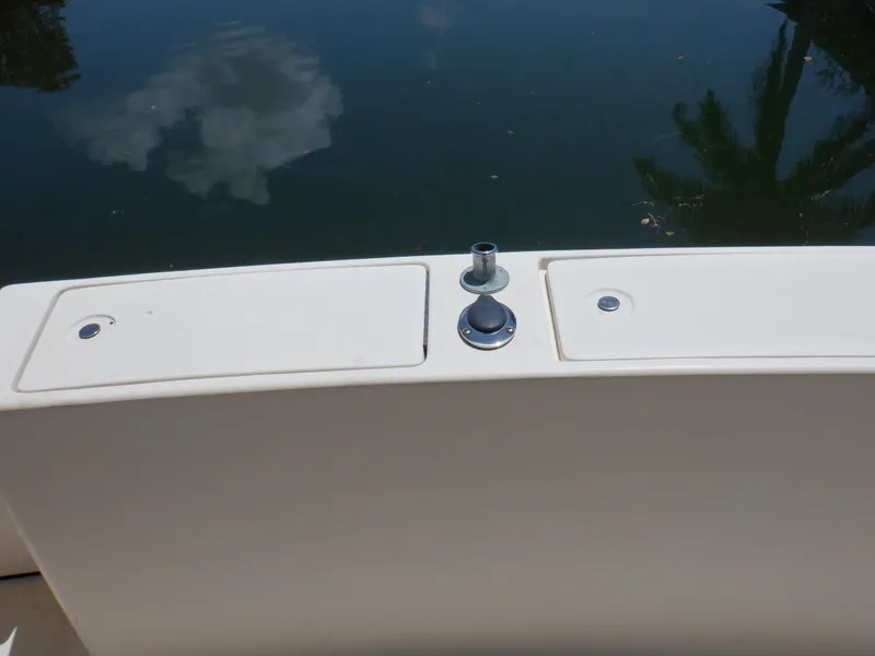 Slide: The Image of 2006 Mainship 34 Trawler deck detail with water reflection. - 22