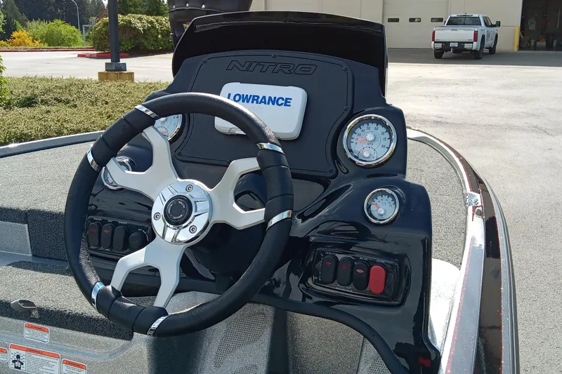 Slide: The Image of Steering console of a 2025 Nitro Z17 boat with Lowrance electronics. - 3