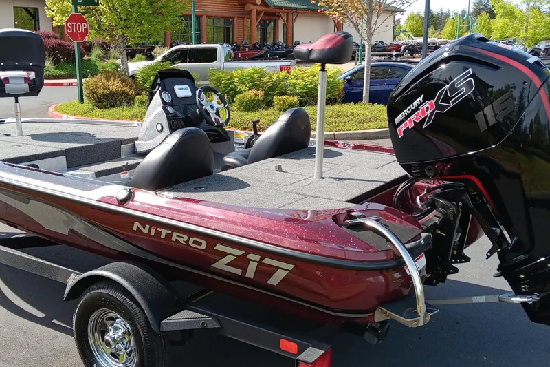 Slide: The Image of 2025 Nitro Z17 boat with powerful engine, parked outdoors on a sunny day. - 4