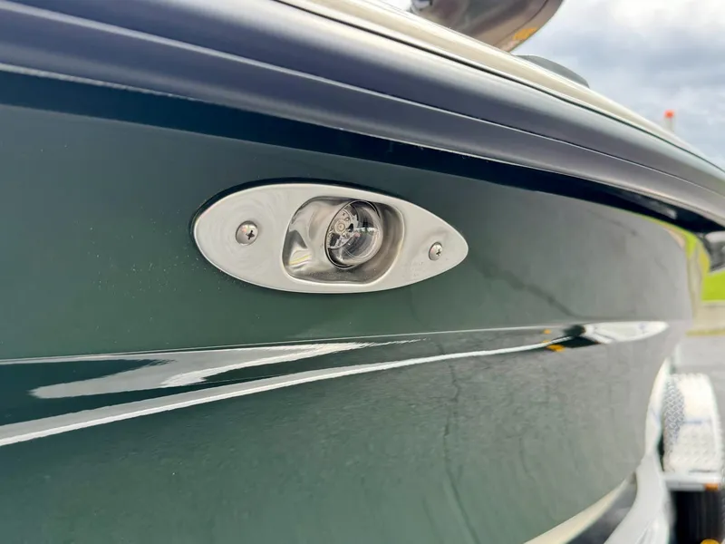 Slide: The Image of 2025 Mako 18 Pro Skiff Backwater Edition, close-up of side light detail. - 10