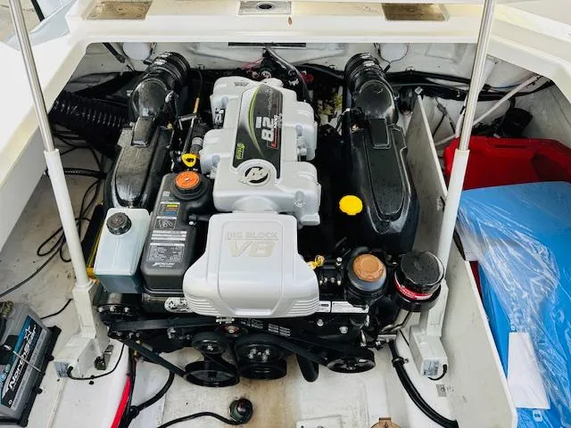 Slide: The Image of Engine compartment of a 2022 Cobalt R8 boat, featuring a powerful V8 engine. - 26