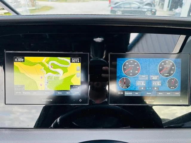 Slide: The Image of Dashboard of a 2022 Cobalt R8 with dual Garmin displays showing navigation and engine data. - 27