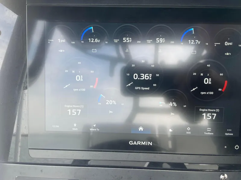 Slide: The Image of Garmin display on 2022 Blackfin 272 CC boat showing engine metrics and GPS speed. - 11