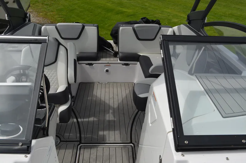 Slide: The Image of 2021 Yamaha Boats 252SD interior with sleek seating and modern design. - 18