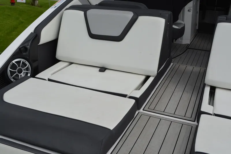 Slide: The Image of 2021 Yamaha Boats 252SD interior with sleek seating and modern design. - 8