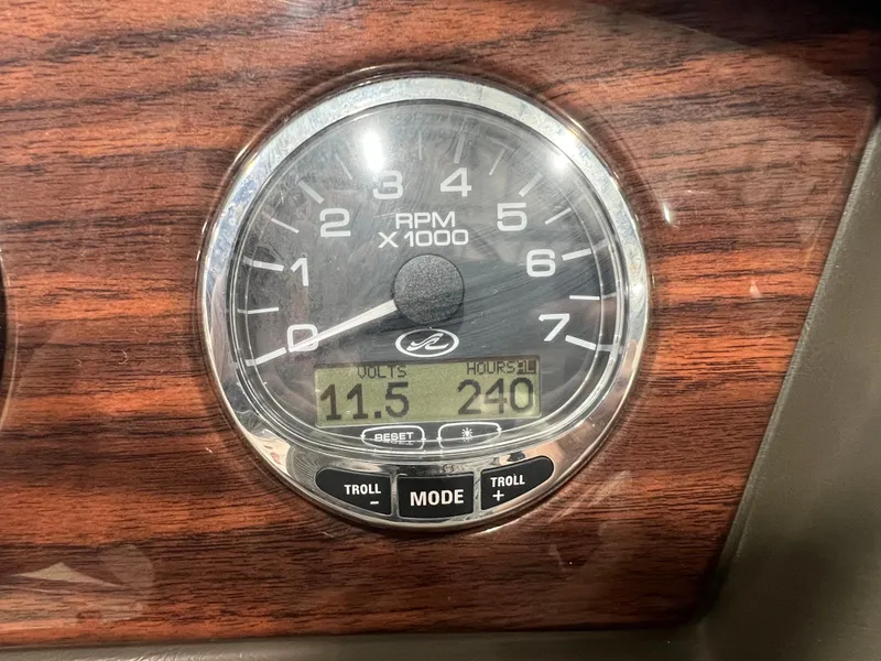 Slide: The Image of Tachometer of 2008 Sea Ray 230 Select boat displaying RPM, volts, and hours. - 11