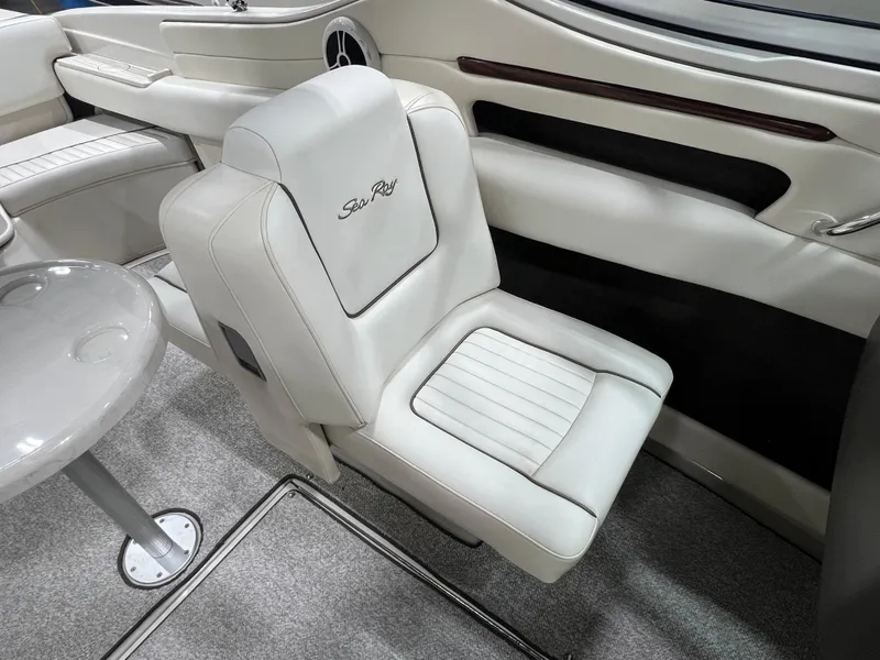 Slide: The Image of Luxurious interior of 2008 Sea Ray 230 Select boat with plush seating and modern design. - 12