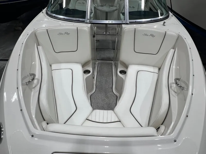 Slide: The Image of 2008 Sea Ray 230 Select boat interior with white seating and cup holders. - 15