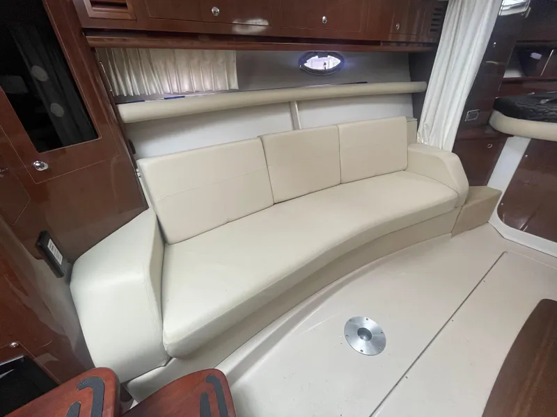 Slide: The Image of Interior of 2014 Four Winns Vista 375 yacht with cream leather seating. - 25