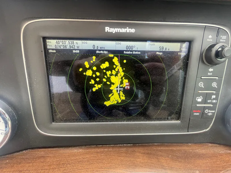 Slide: The Image of Raymarine navigation display on 2014 Four Winns Vista 375 boat, showing radar data. - 37