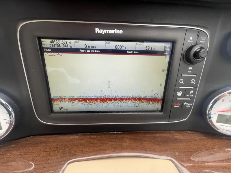 Slide: The Image of Raymarine navigation display on 2014 Four Winns Vista 375 boat dashboard. - 38