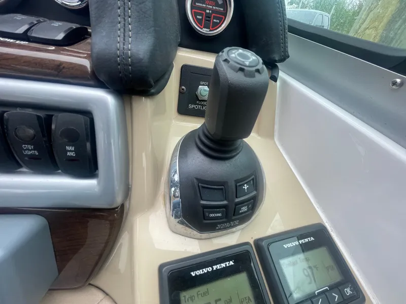 Slide: The Image of Control panel of 2014 Four Winns Vista 375 boat with joystick and Volvo Penta displays. - 40