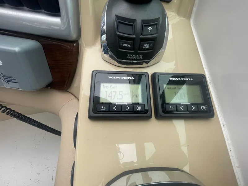 Slide: The Image of Control panel of a 2014 Four Winns Vista 375 boat with Volvo Penta displays. - 41