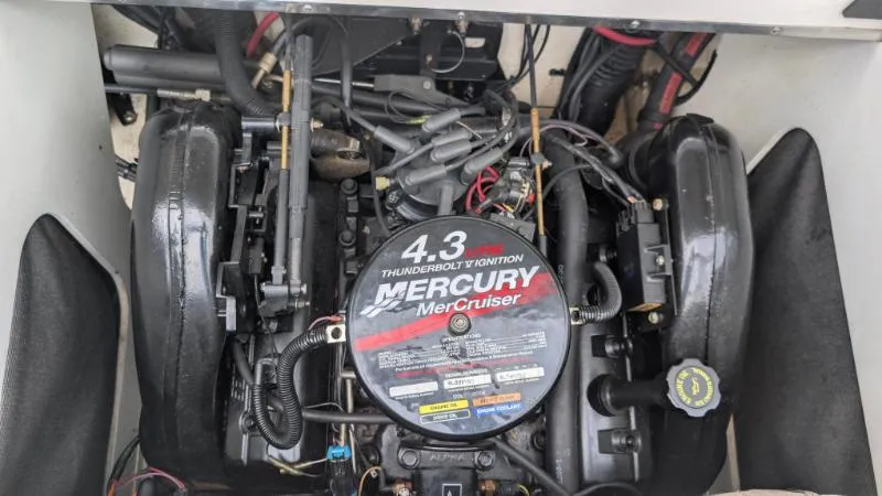 Slide: The Image of Engine of a 2001 Sea Ray 185 Sport Boat with Mercury MerCruiser 4.3L. - 1