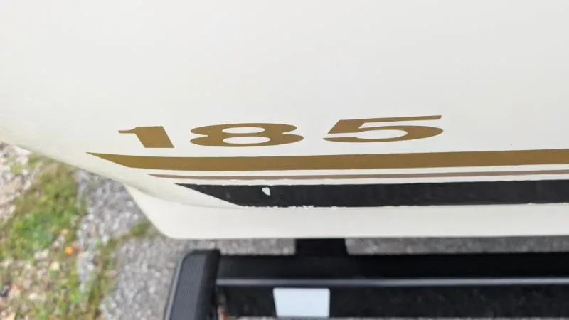 Slide: The Image of 2001 Sea Ray 185 Sport Boat, close-up of hull with "185" decal. - 10