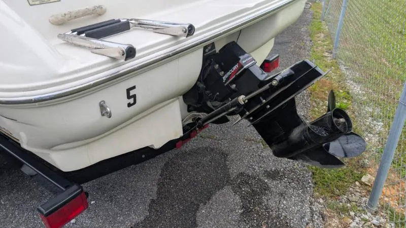 Slide: The Image of Rear view of a 2001 Sea Ray 185 Sport Boat with outboard motor. - 11