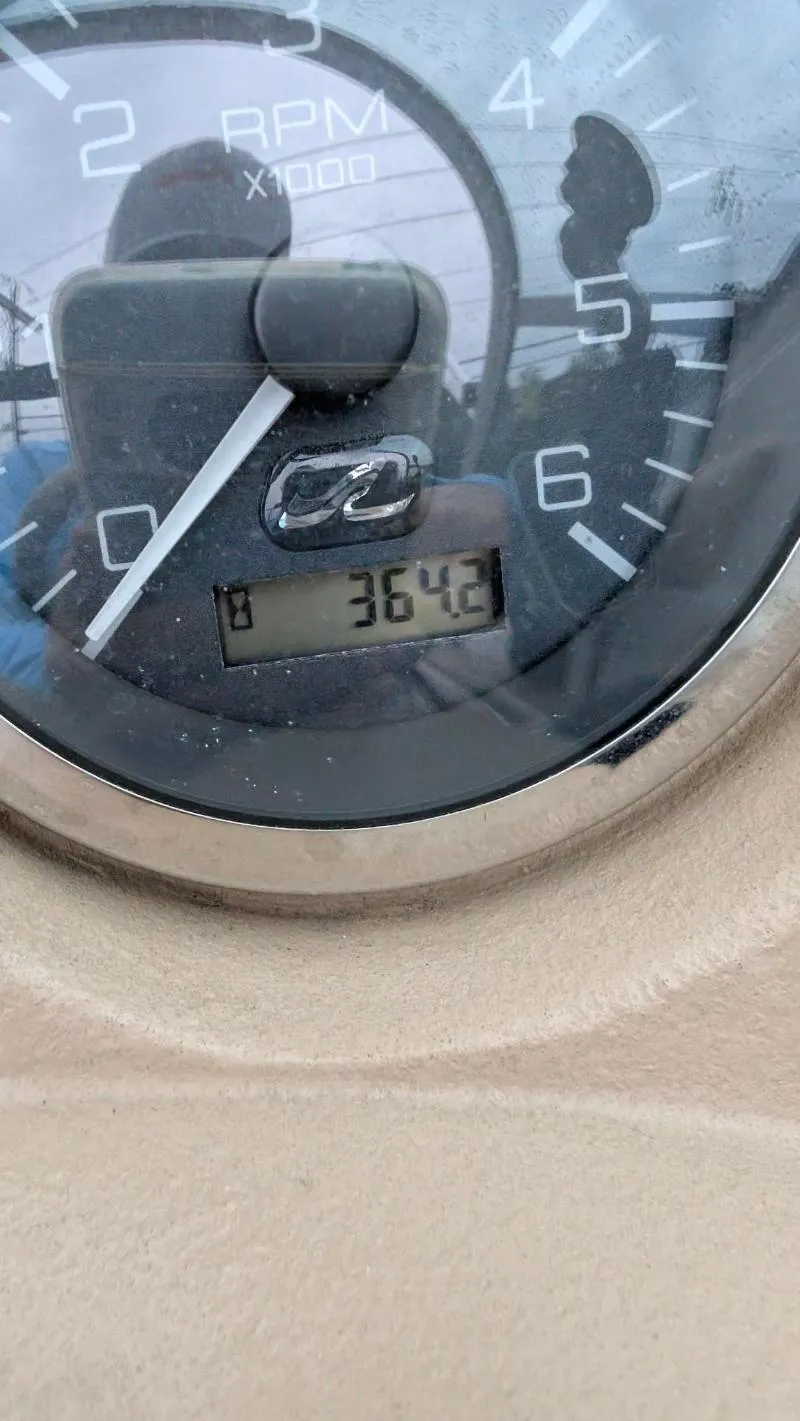 Slide: The Image of Close-up of a Sea Ray 185 Sport Boat tachometer showing 3642 RPM. - 4