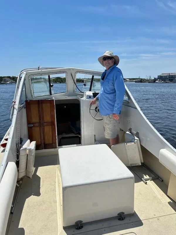 Slide: The Image of Man steering 1985 SISU Softtop Cruiser on a sunny day. - 10